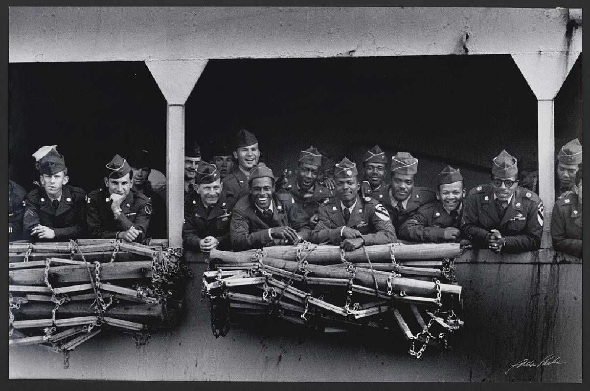 A black and white photograph of soldiers on a boat. Next Avenue, Gordon Parks, Photography
