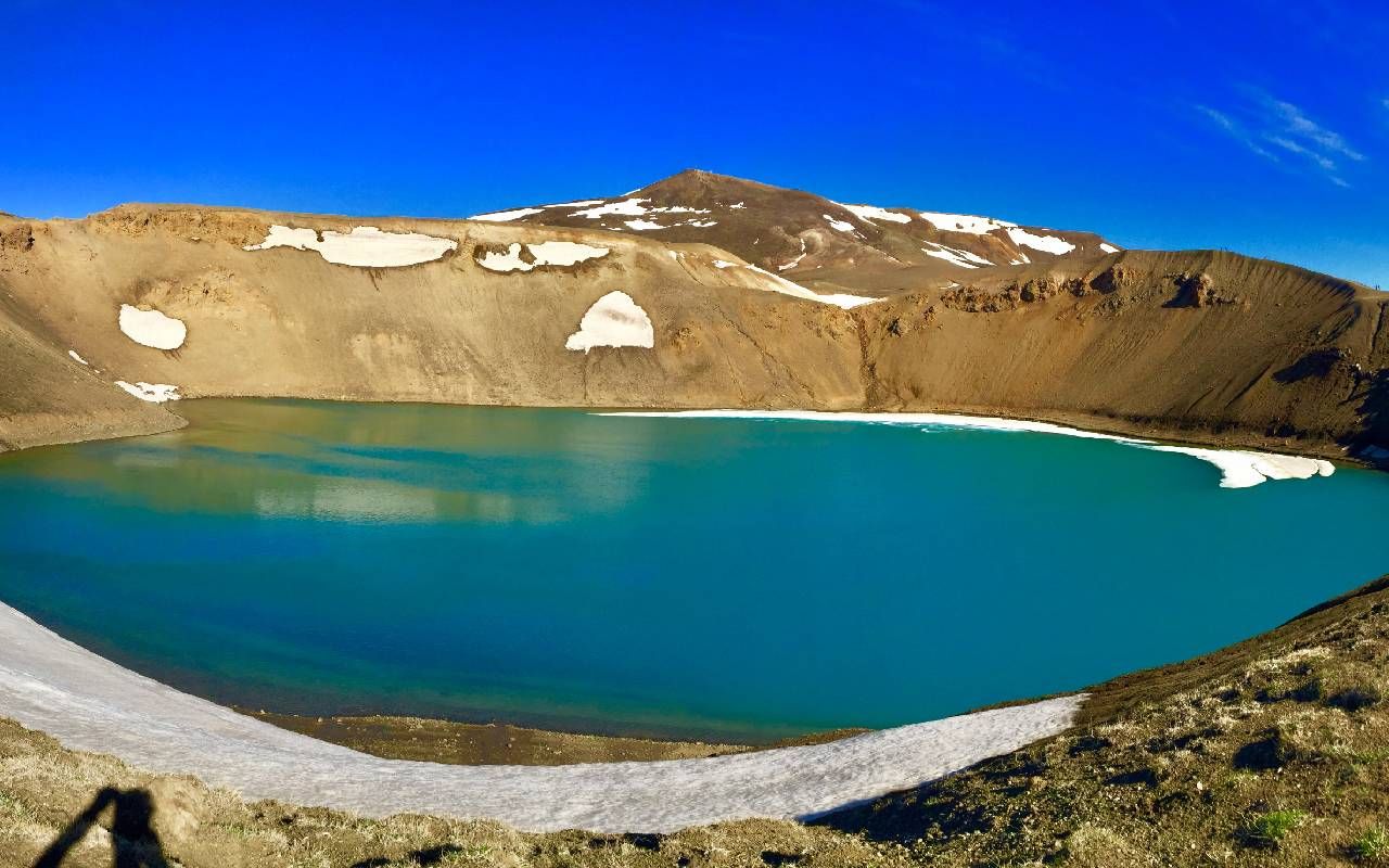 A volcano crater lake. Next Avenue, travel to Iceland