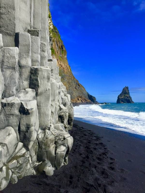 A beach with black sand. Next Avenue, travel to Iceland