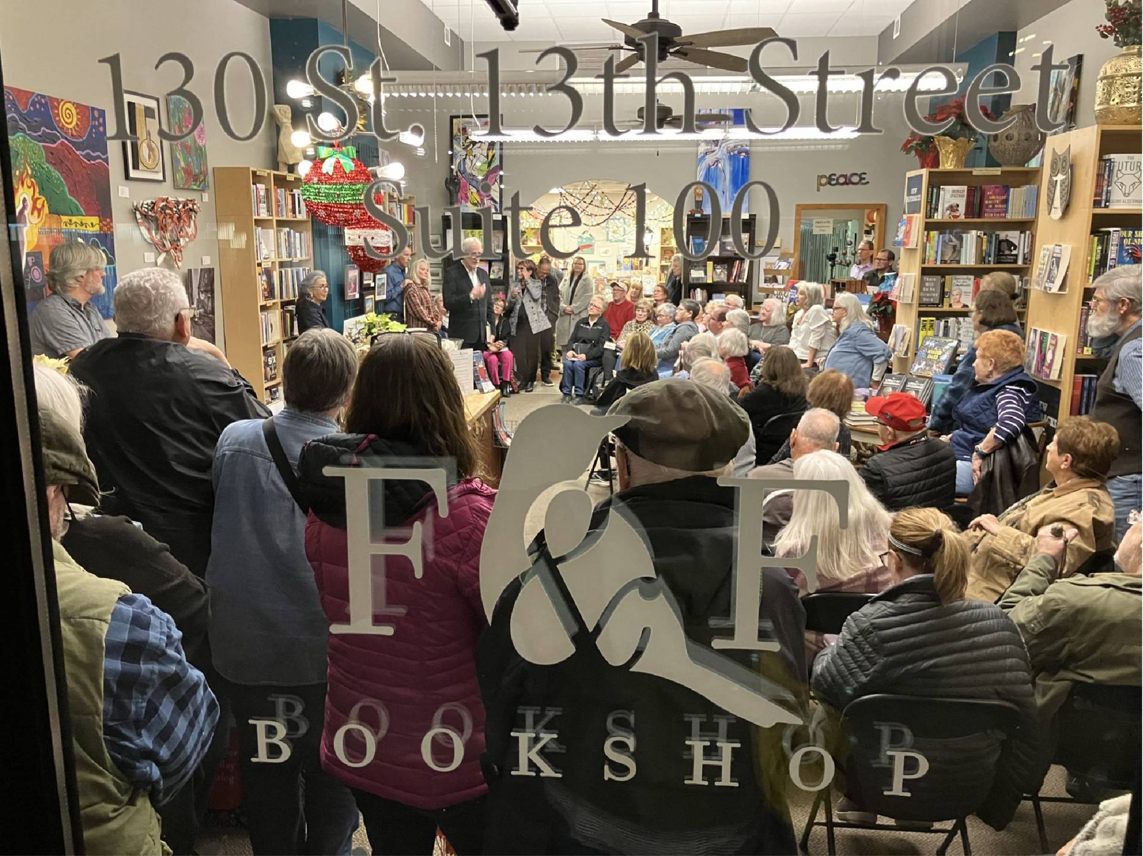 A crowd gathered inside a bookstore. Next Avenue, midlife career change
