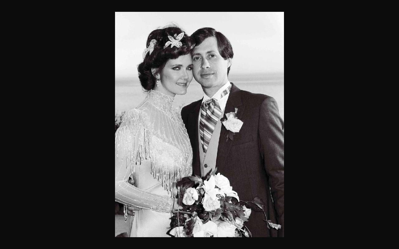 A black and white photo of a couple on their wedding day. Next Avenue, Lynda Carter
