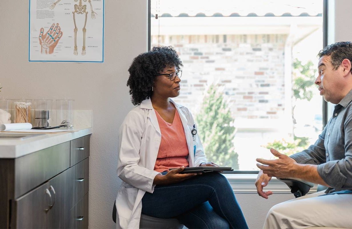 A patient being candid with their doctor and communicating. Next Avenue
