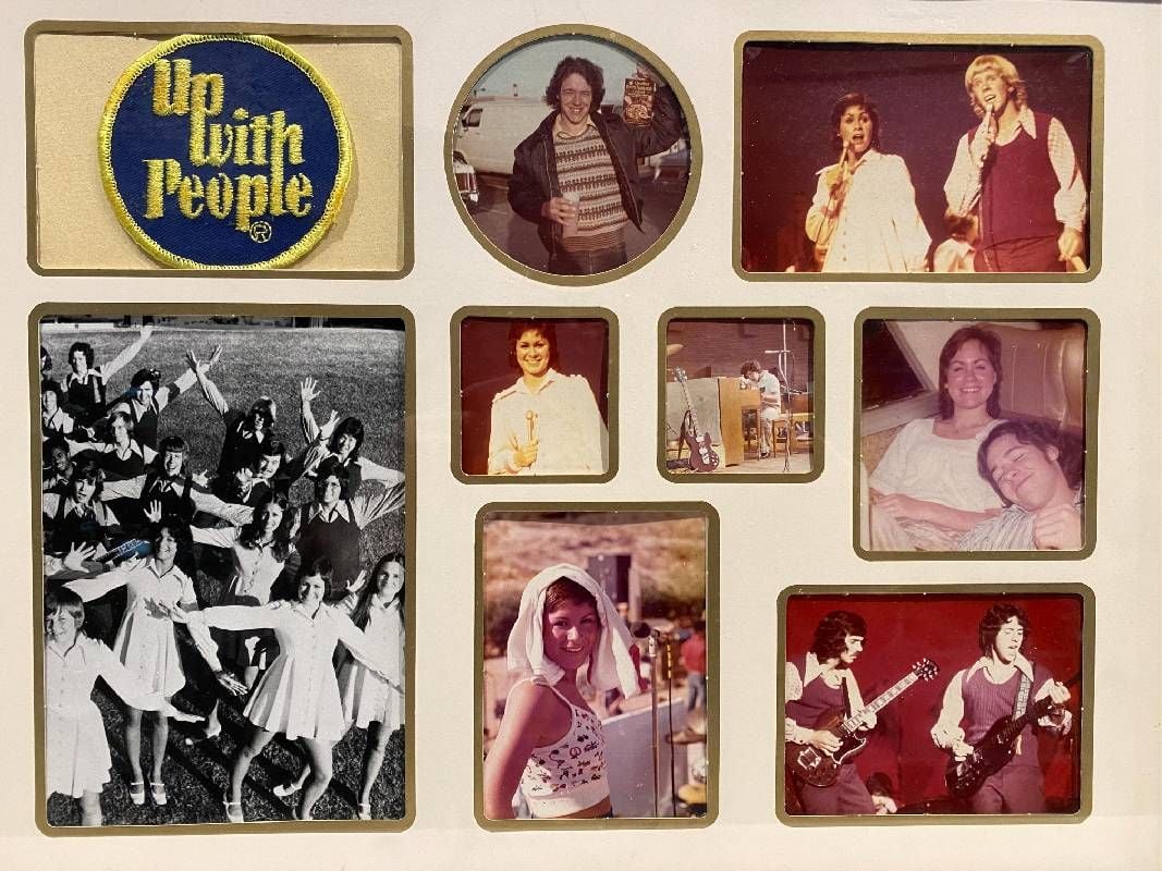 A photo album with vintage photos of 'Up with People.' Next Avenue