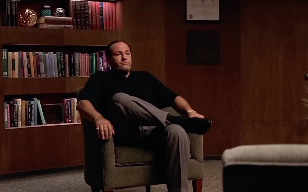 A still from The Sopranos with Tony Soprano sitting in a chair in his therapist's office