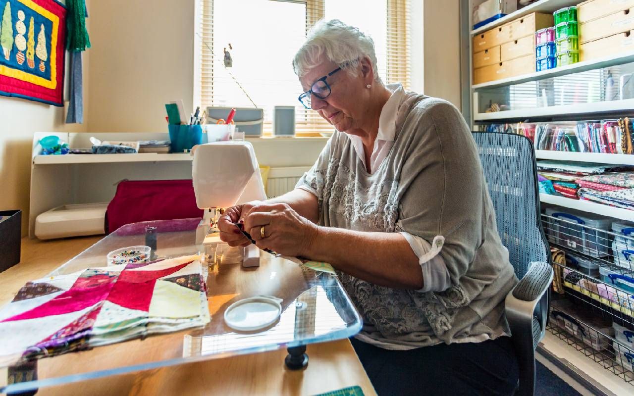 A woman working on her quilting project. Next Avenue, gentle hobby