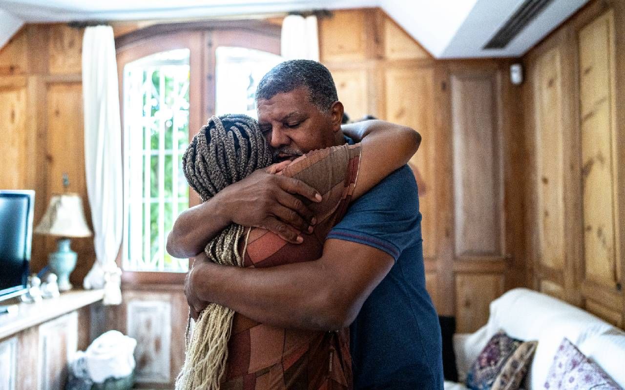 A father and daughter embracing after talking about mental illness. Next Avenue, mental health stigma