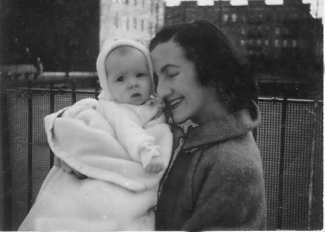 A black and white photo of a woman holding a baby. Next Avenue, mother, grandmother, relationship