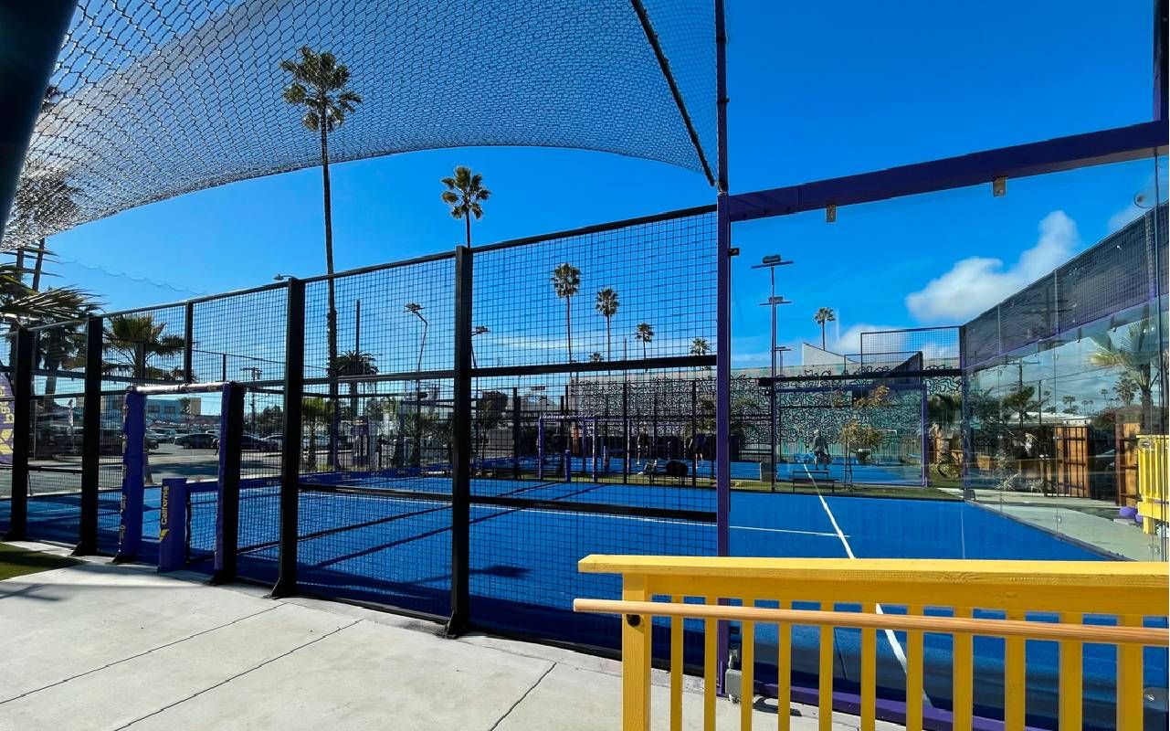 Padel courts with nets above the court. Next Avenue, pickleball