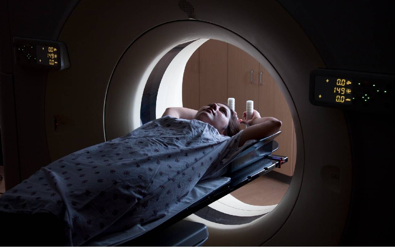 A woman undergoing a scan for cancer. Next Avenue, anxiety about cancer scan, screening