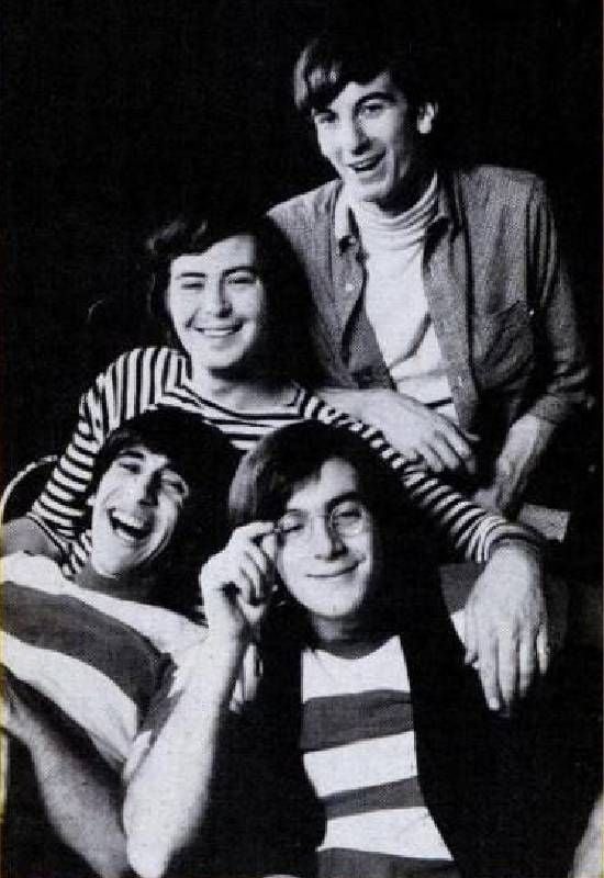 A vintage photo of 4 members of the lovin spoonful. Next Avenue, John Sebastian