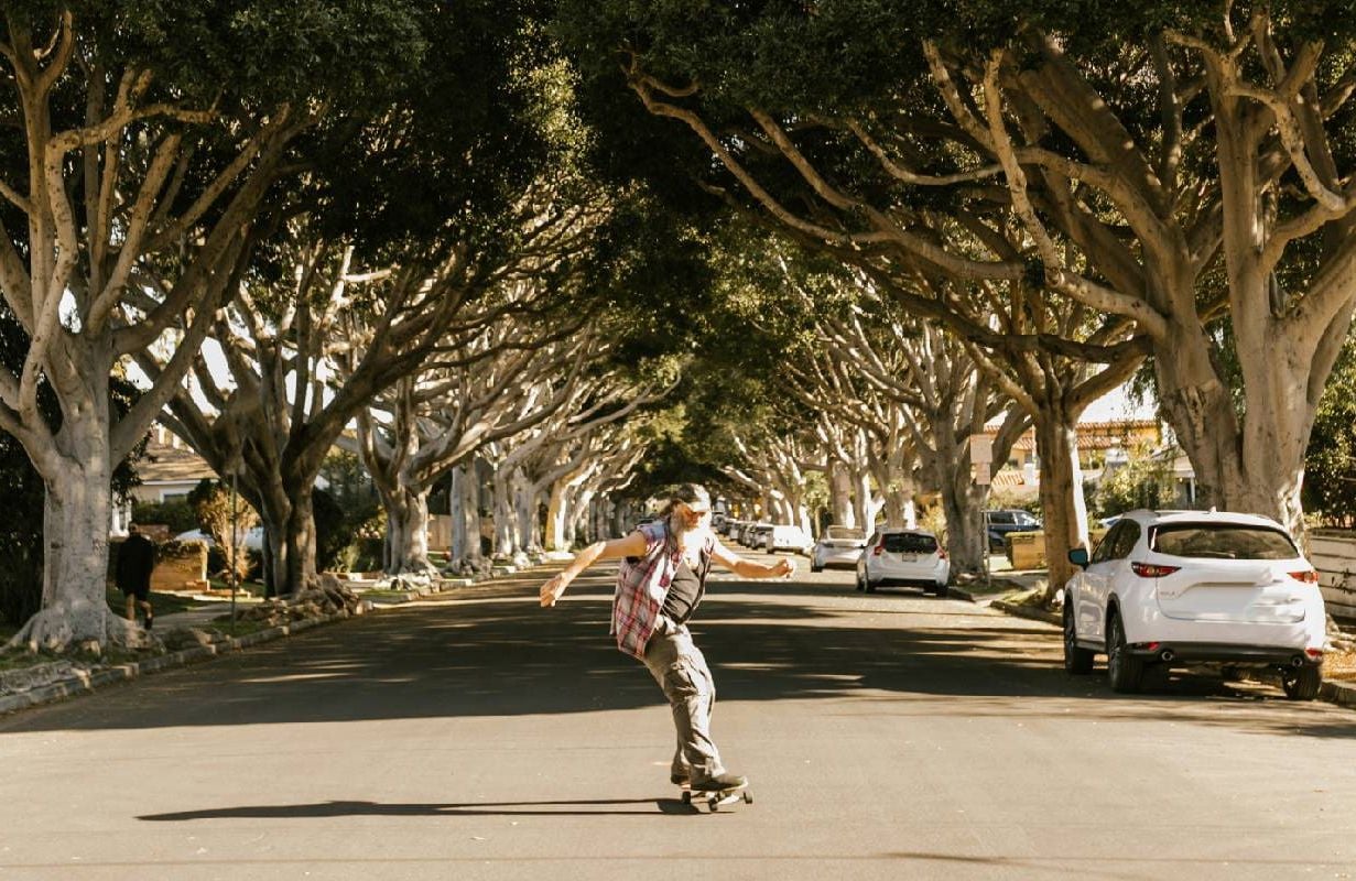 An older man enjoying life and skateboarding outside. Next Avenue, perception of aging, ageism