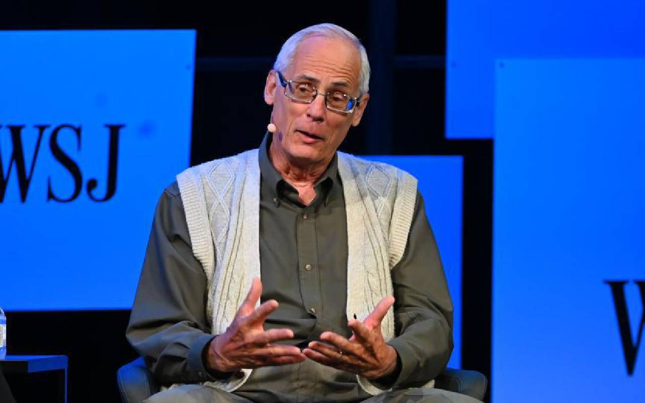 A man sitting on stage during a discussion. Next Avenue, Ted Benna, 401 (k) creator