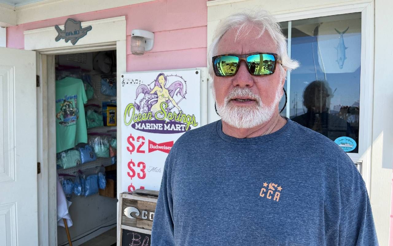 A man standing in front of his shop. Next Avenue, climate change, entrepreneurs