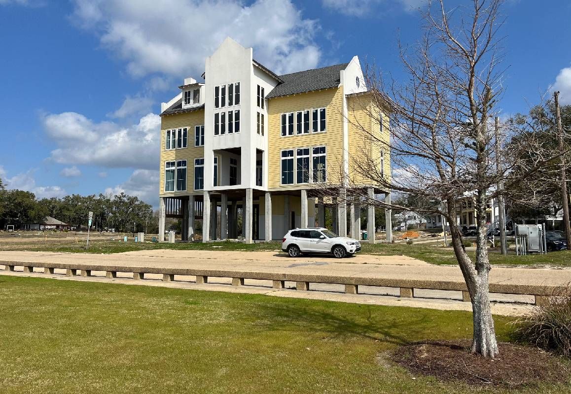 A large house standing up on stilts. Next Avenue, climate change, entrepreneurs