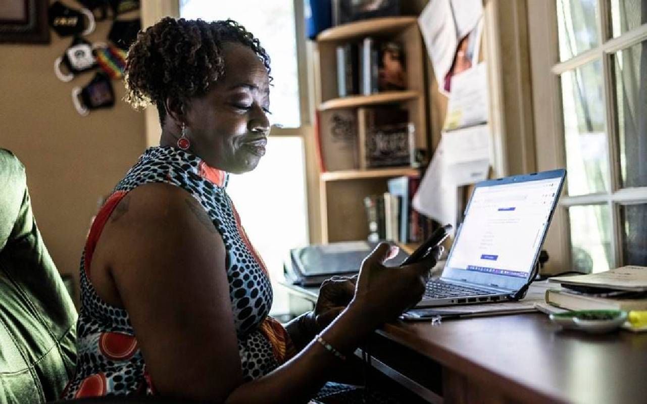 A woman who is in post-retirement working from home at a startup. Next Avenue