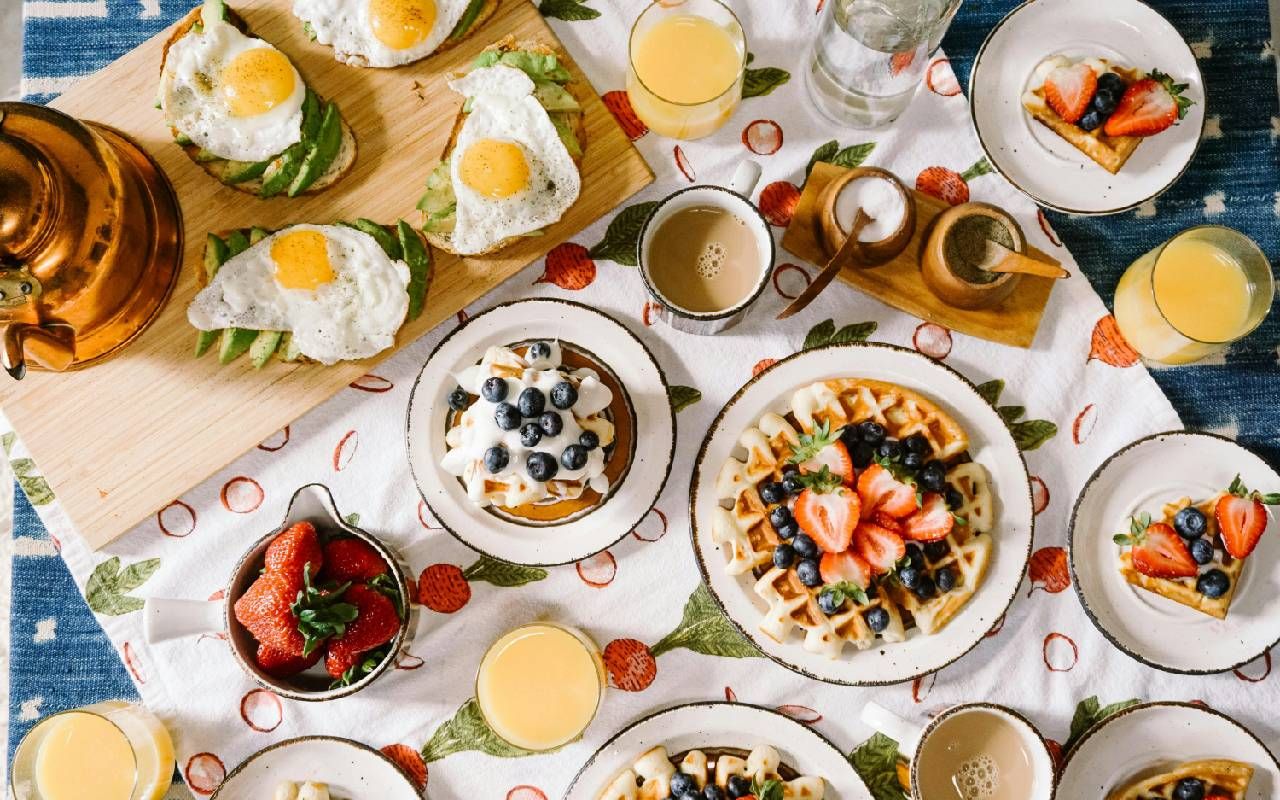 A table set with breakfast foods for a healthy big breakfast. Next Avenue, Chronobiology
