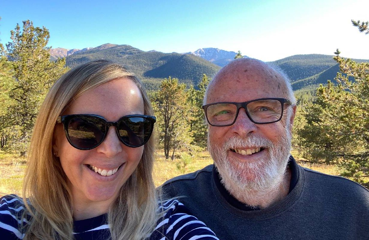 A father and his adult daughter taking a selfie together. Next Avenue, father daughter roadtrip