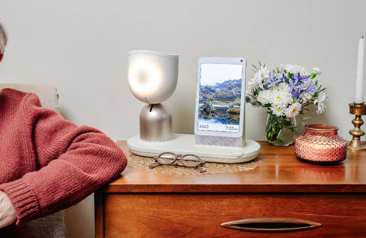Closeup of an AI robot device on top of a dresser