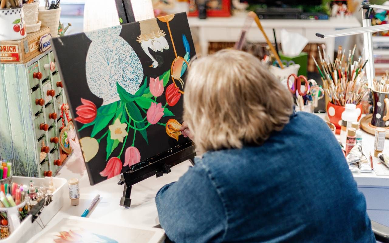 A woman painting. Next Avenue, Mary Engelbreit