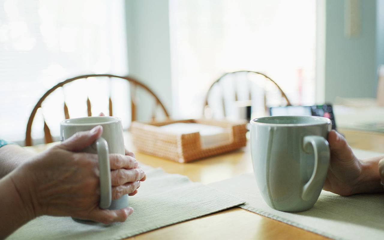 Two people having a hard conversation. Next Avenue, estate planning, older parents