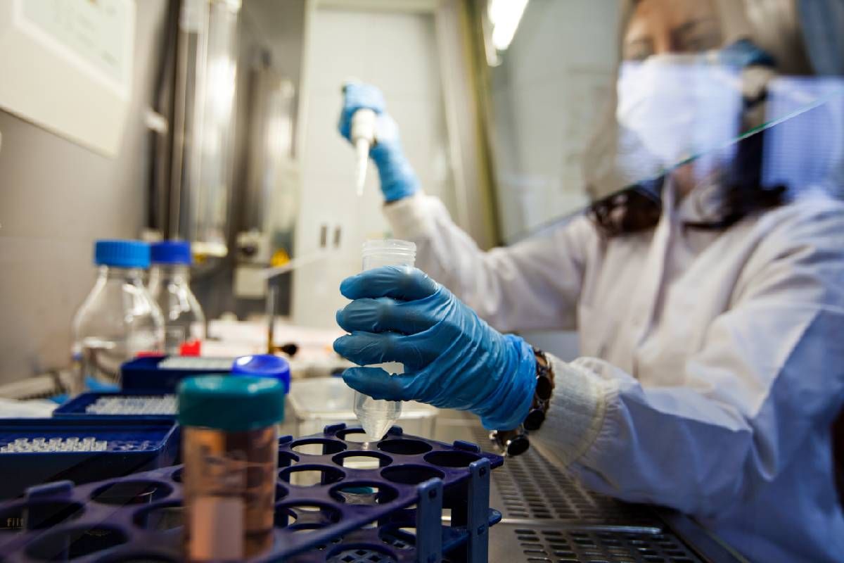 A scientist researching in a lab. Next Avenue