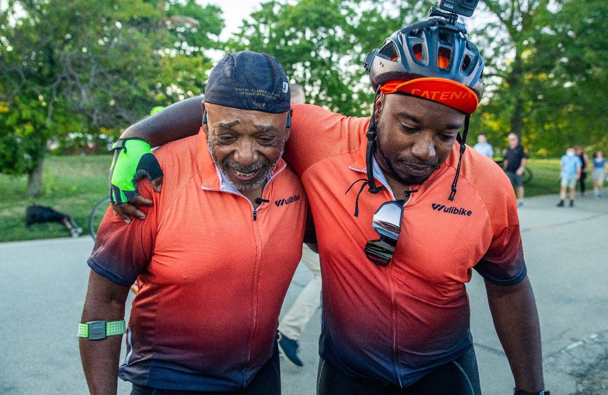 Father and son, Donnie and Eric celebrating the completion of their 350-mile bike trip. Next Avenue, Bike Vessel