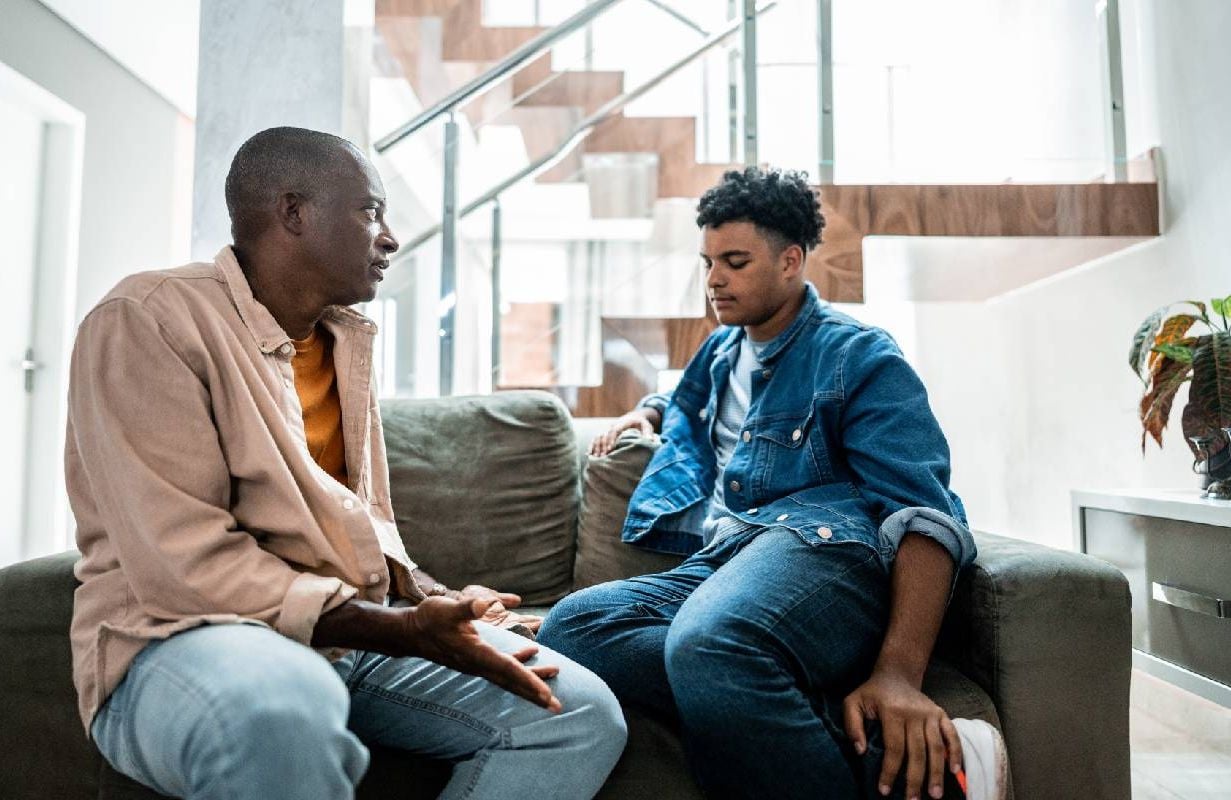 A parent talking to their adult child about co-signing a loan. Next Avenue