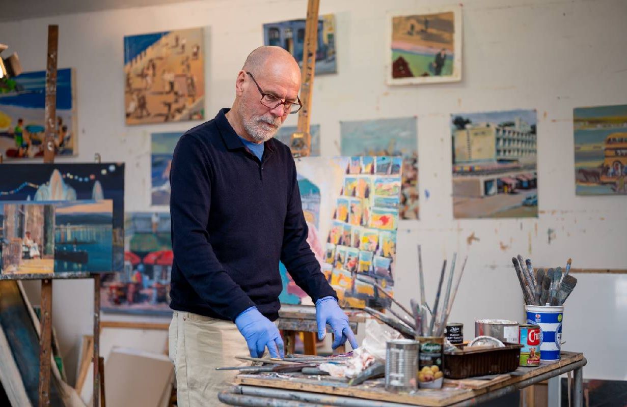 An older man who teaches a painting class. Next Avenue