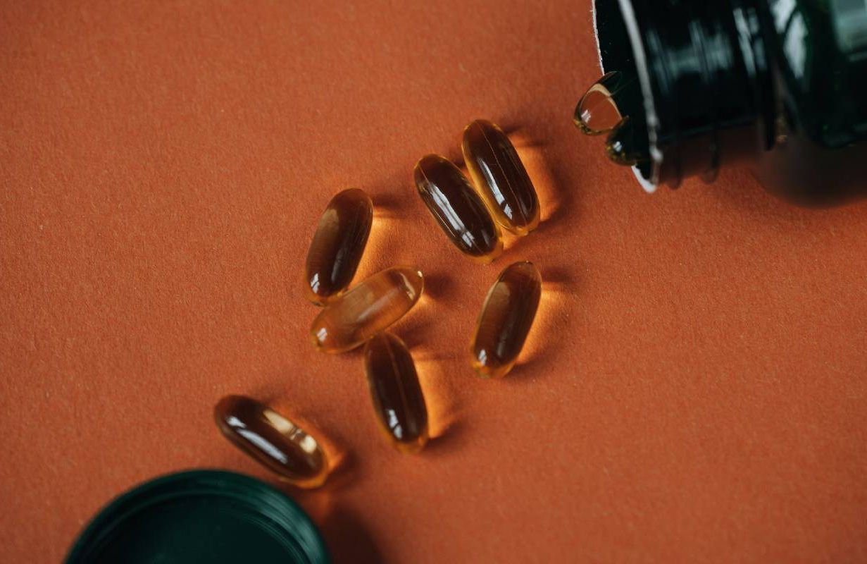 A close up shot of vitamin D supplements. Next Avenue, calcium, bone loss