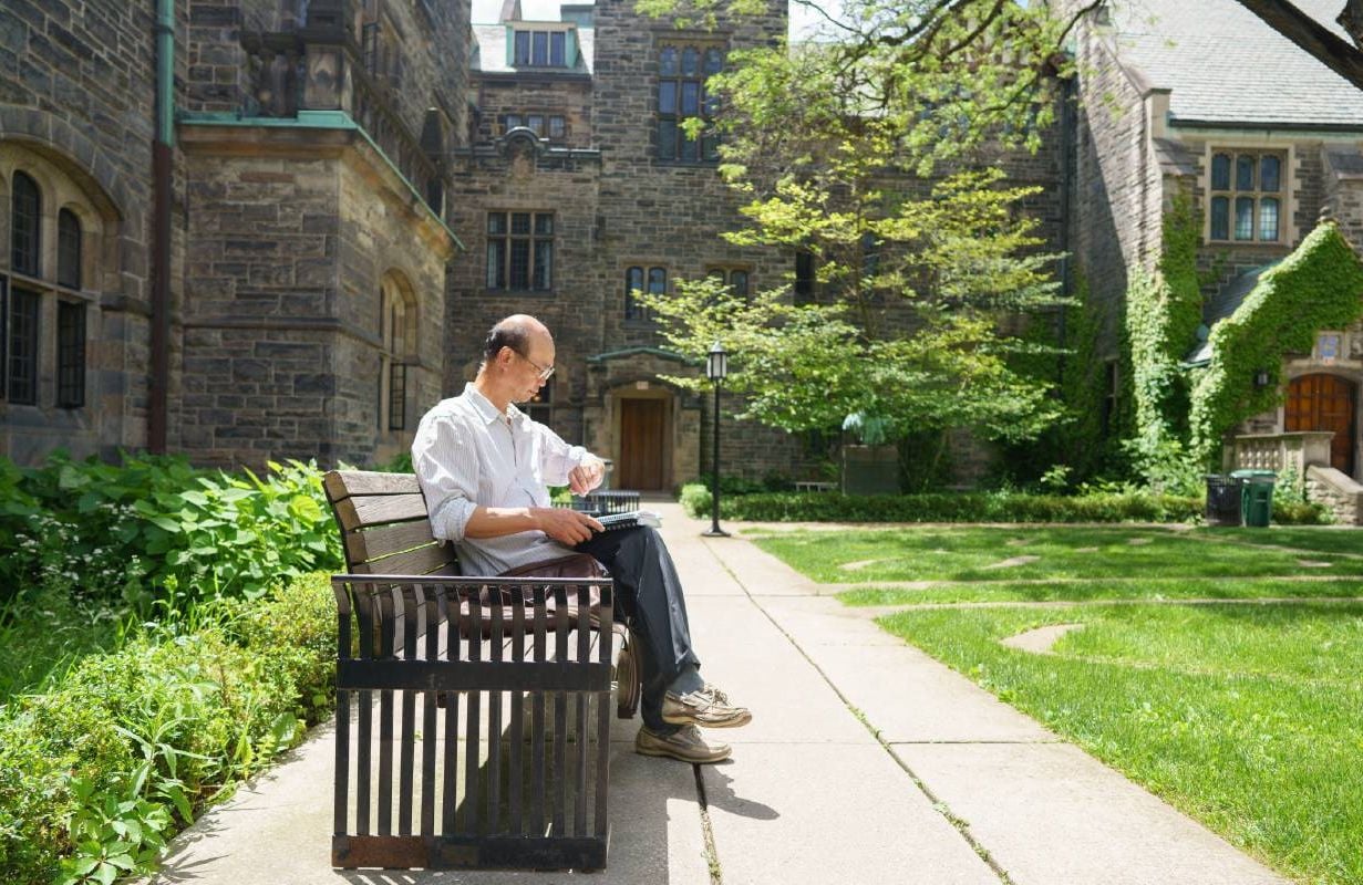 An unretired adult waiting for his class to start in college. Next Avenue, higher education, continuing edication