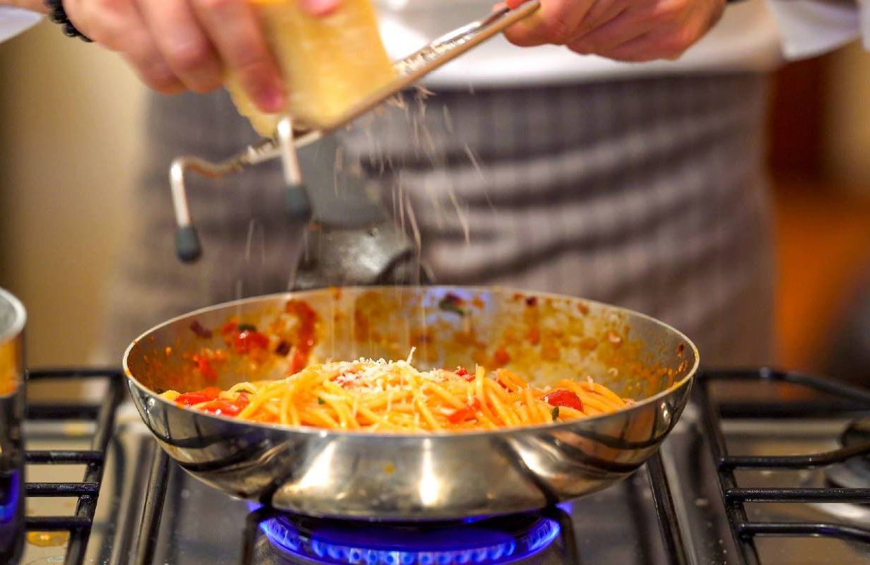A professional chef cooking in a home kitchen. Next Avenue, retirement, unretirement