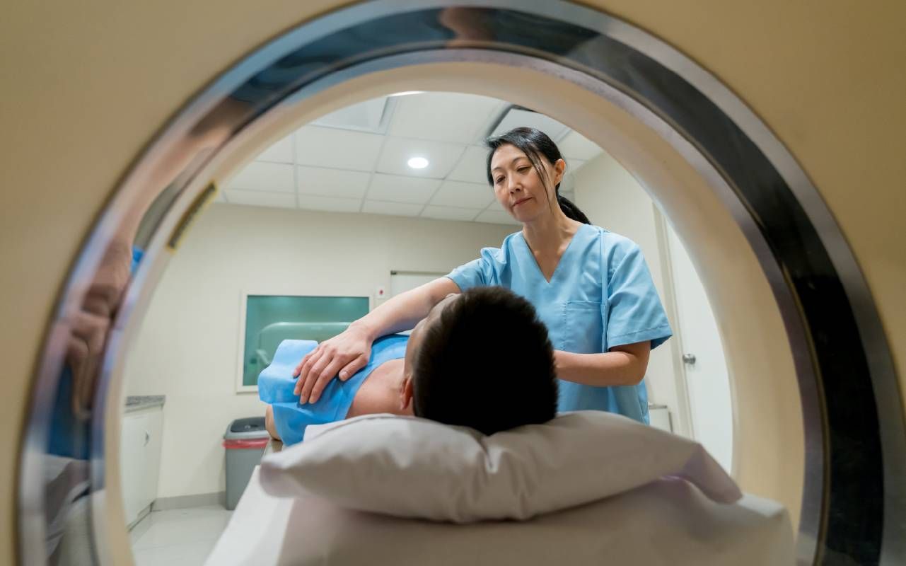 A person getting an MRI at a hospital. Next Avenue, seizure