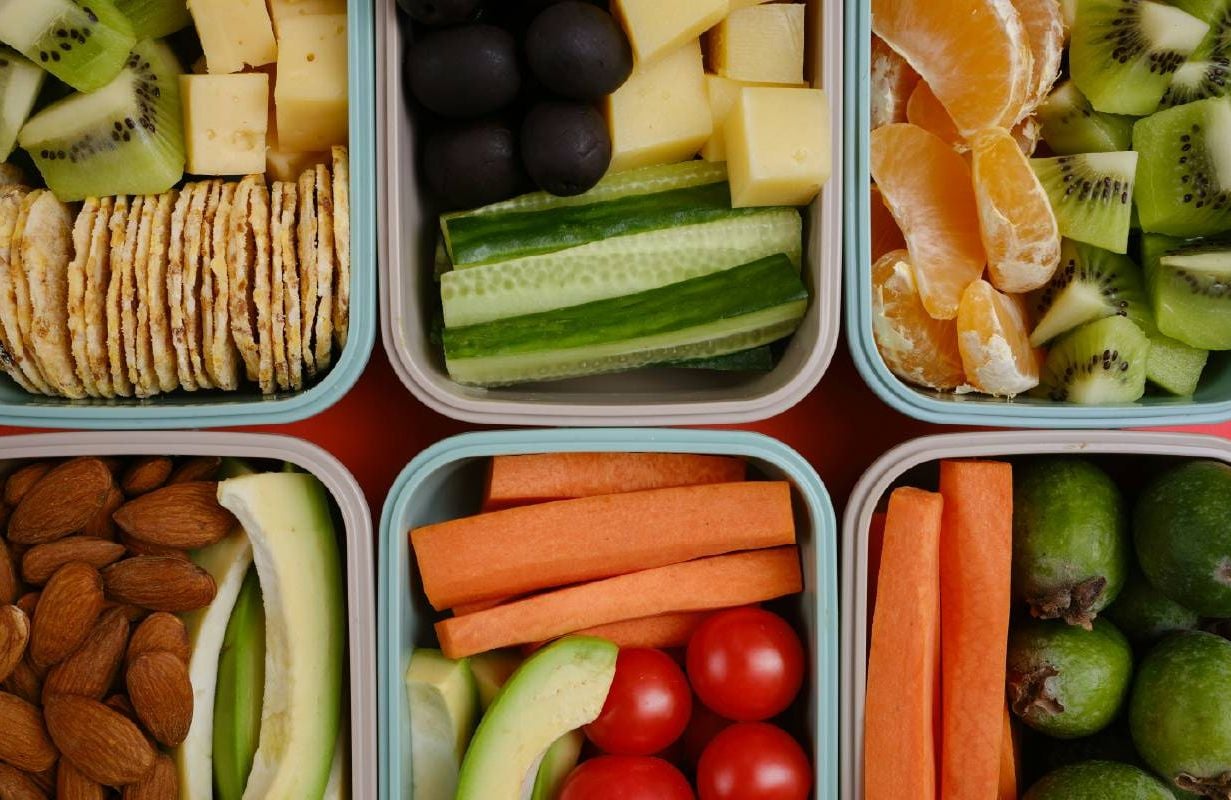 Tupperware filled with healthy food. Next Avenue weight loss program