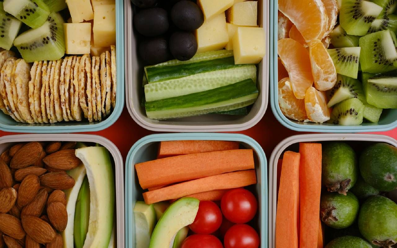 Tupperware filled with healthy food. Next Avenue weight loss program