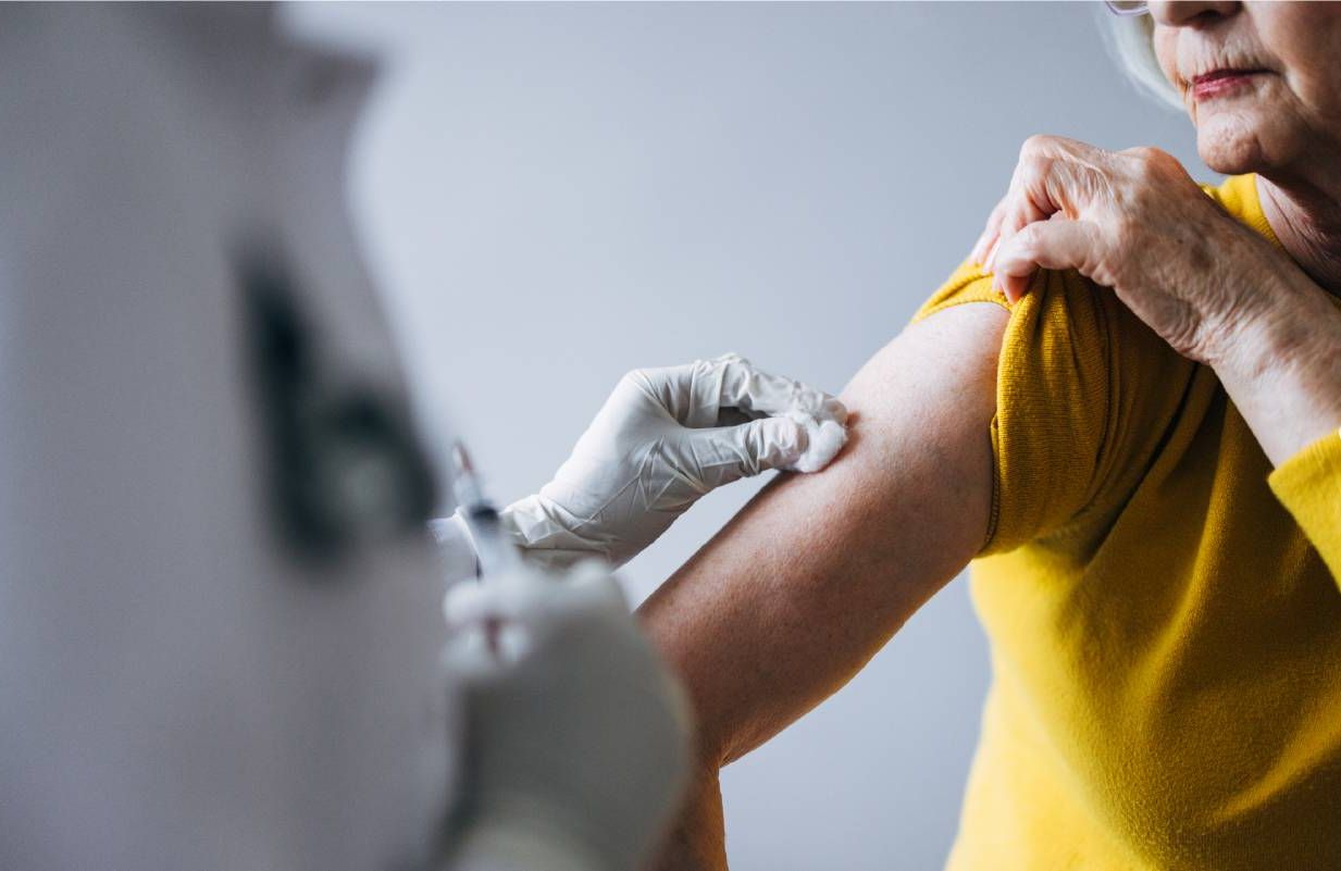 A person getting vaccinated. Next Avenue