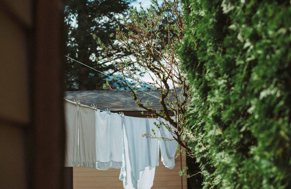 Clothes drying on a clothesline. Next Avenue, allergies or a cold