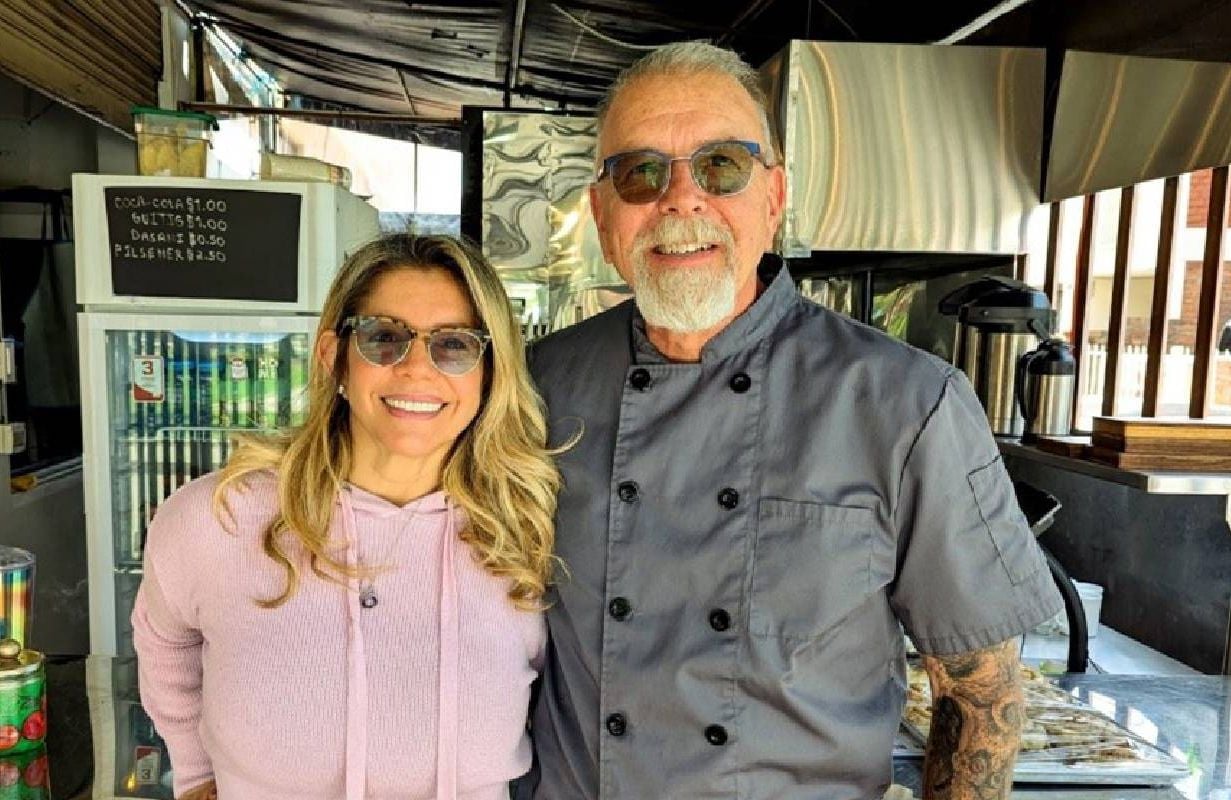 A couple smiling together. Next Avenue, retire abroad