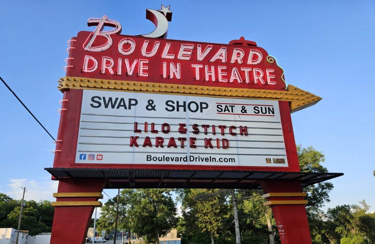 Marquee sign for a drive-in movie theatre. Next Avenue