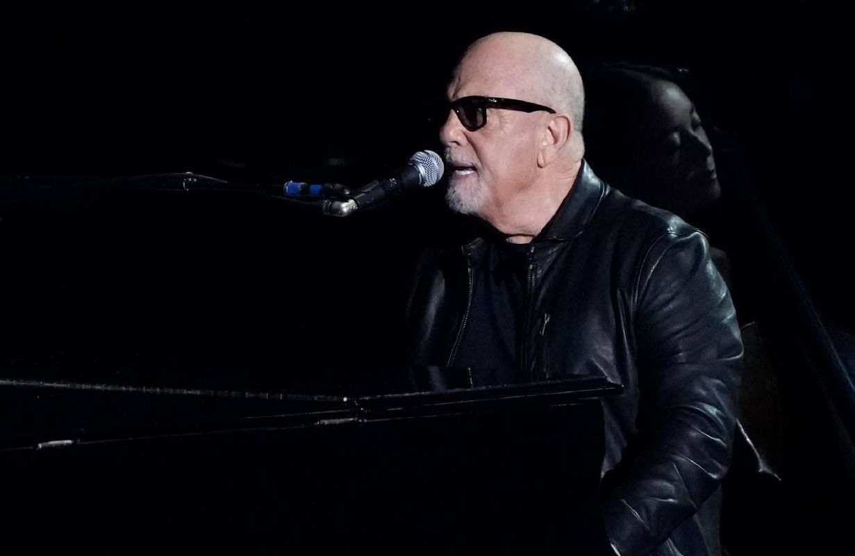 Billy Joel performing on stage. Next Avenue