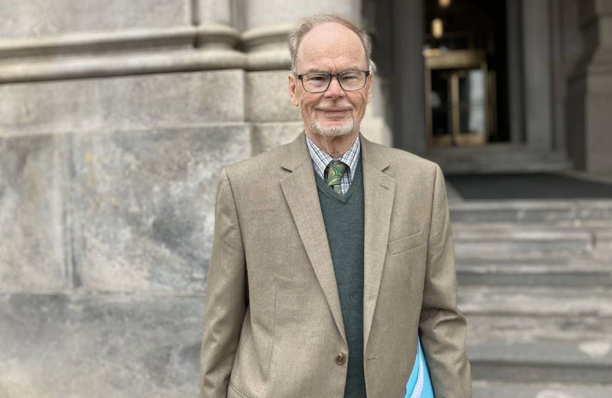 Dr John Rugge outside of a government building. Next Avenue, save medicaid, medicare