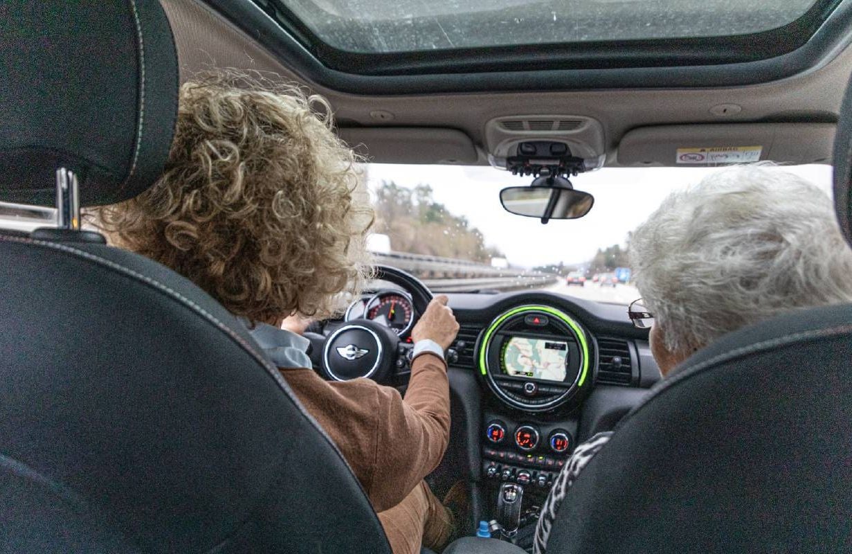 An adult woman driving her older mother. Next Avenue, travel, dementia