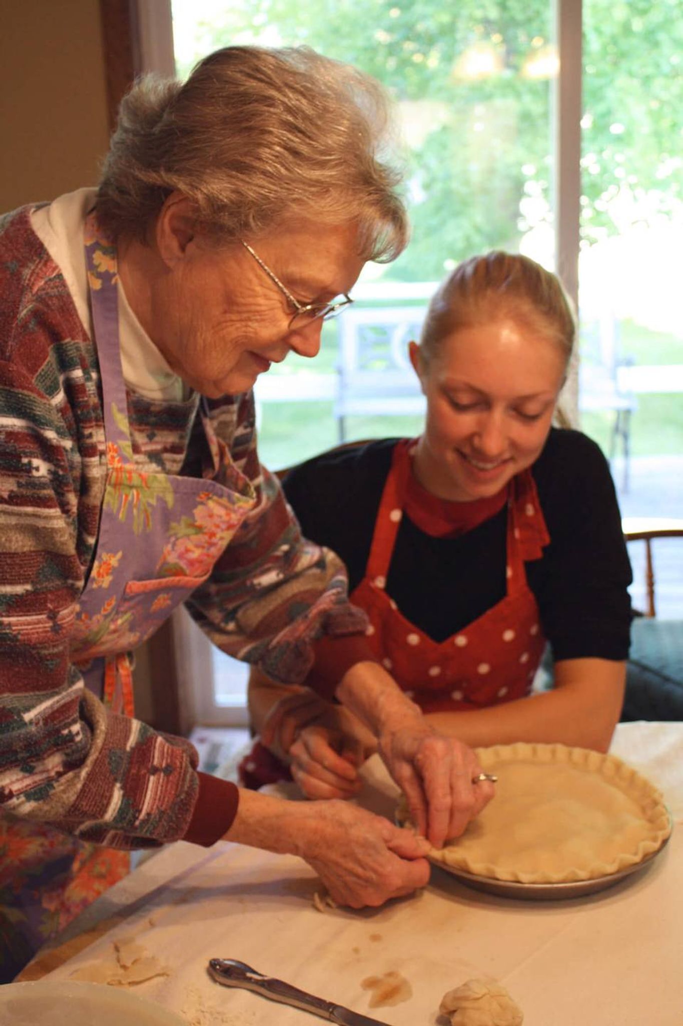 Frances Olson teaching pie crust fluting techniques