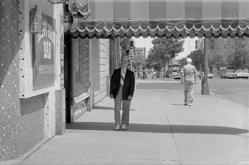 A man outside the Happy Hour Bar in Minneapolis