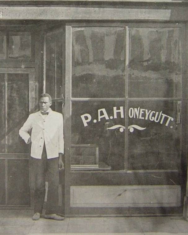 Prince Albert Honeycutt outside his barbershop in Fergus Falls