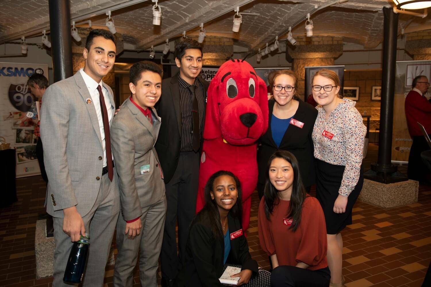 High School Page students who were visiting legislators stopped by the vault for breakfast and hugs from Clifford.