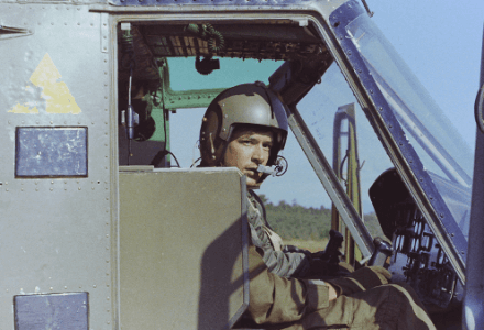 Soldier in a Huey Helicopter in Vietnam