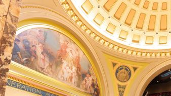 a painting on the ceiling of a building