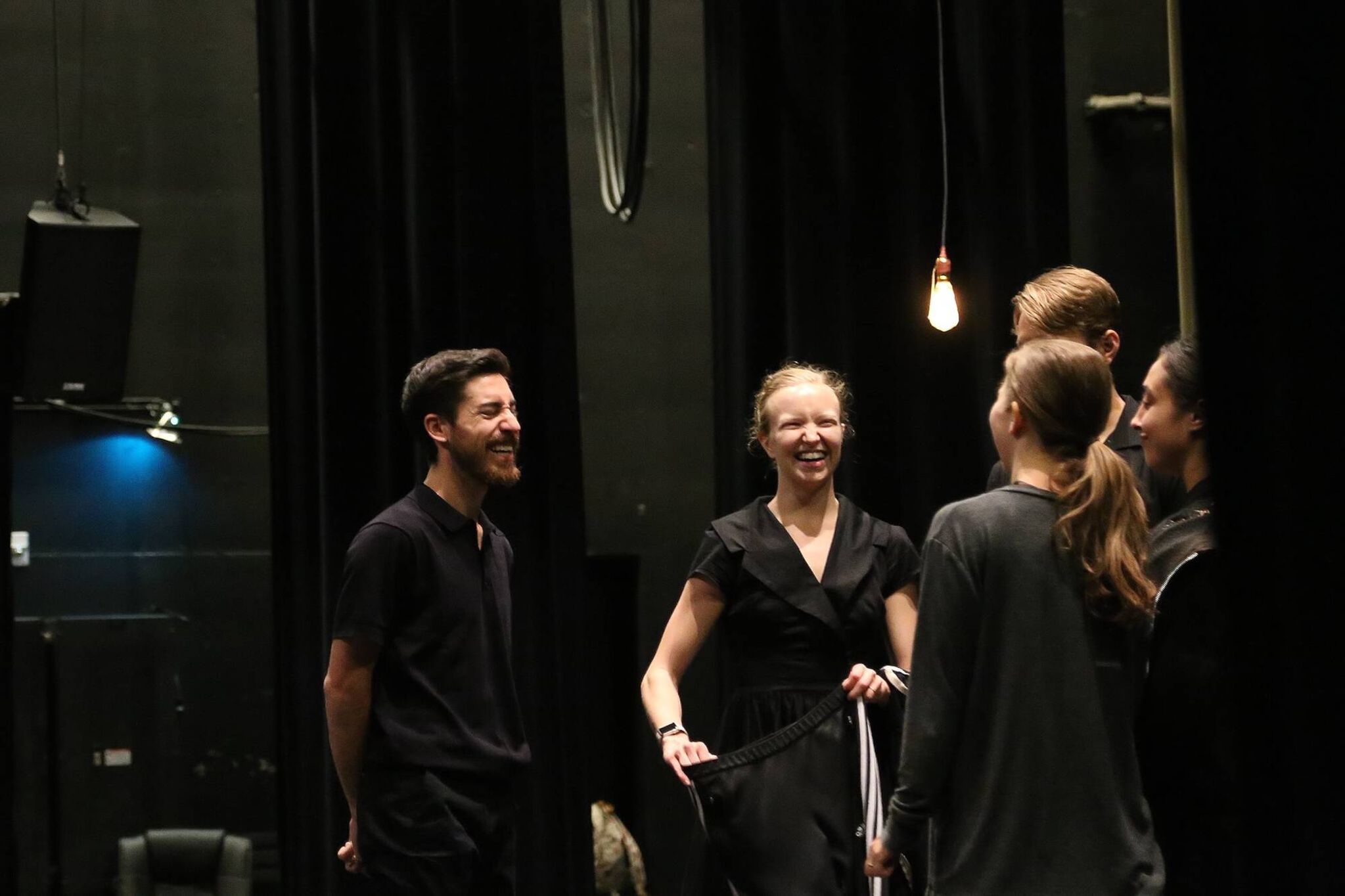 Zenon Company Members share a laugh during rehearsal