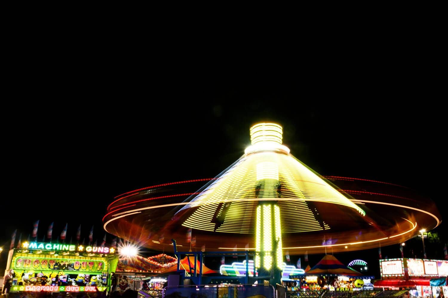 The spinning, whirling rides of the Midway. Photo by Matt Mead.