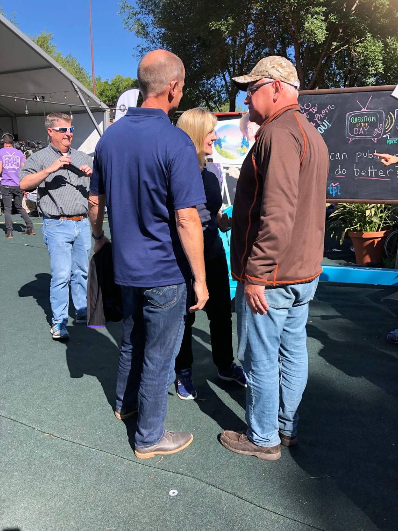 Rep. Melissa Hortman, Sen. Paul Gazelka and Gov. Tim Walz behind the scenes during the live taping of Almanac at the Minnesota State Fair on August 30, 2019.